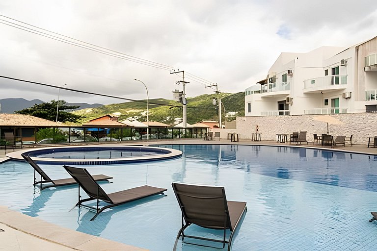 Charmoso apartamento beira mar na Praia dos Anjos