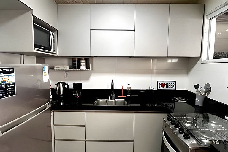 Casa de madeira a 150 m da Praia Grande c/ quintal