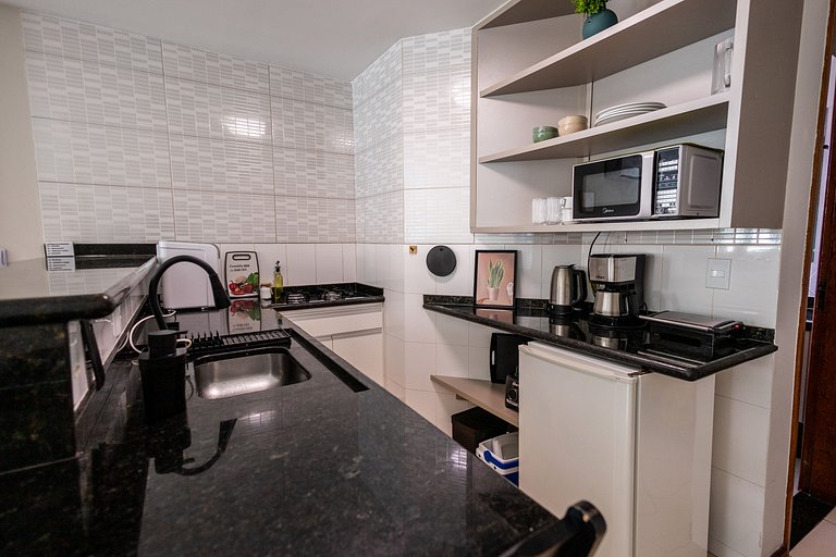 Loft bem equipado, a poucos passos da praia - 320